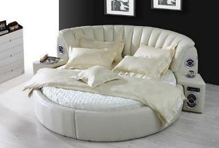 cama-redonda-en-piel-con-sistema-de-audio.jpg